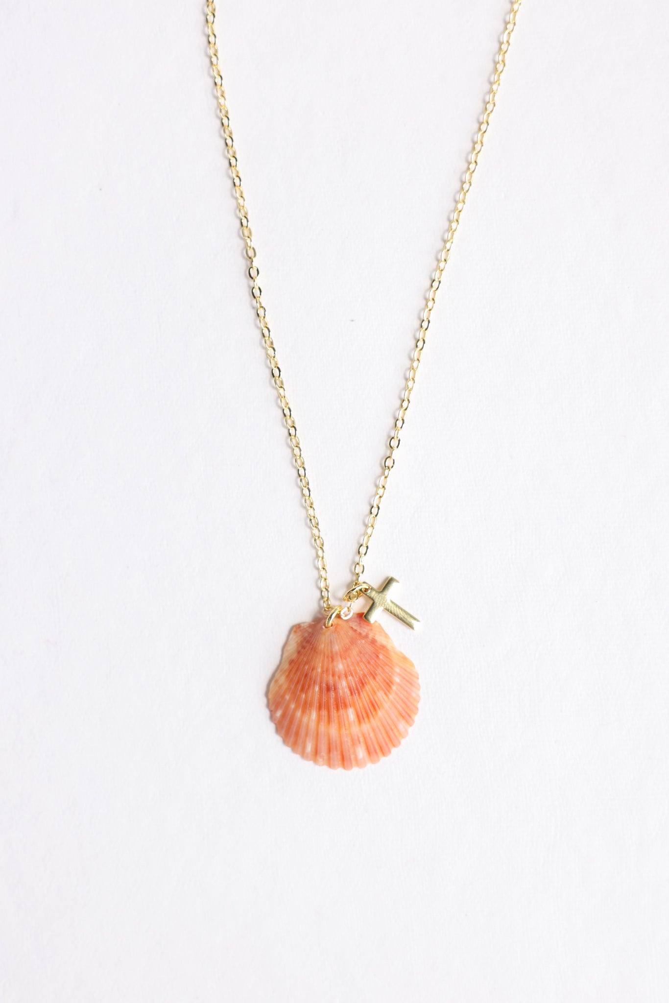 Scalloped cross charm necklace