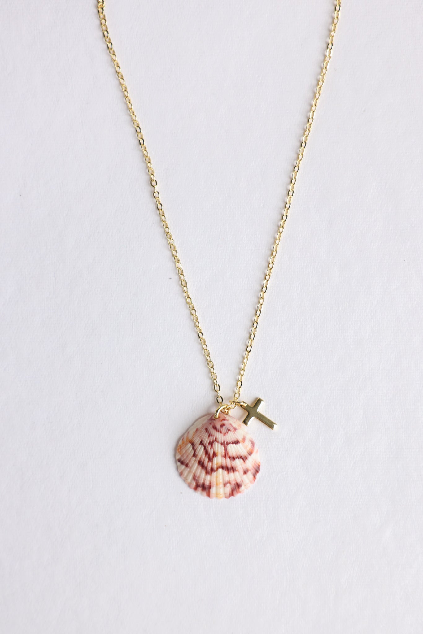 Scalloped cross charm necklace