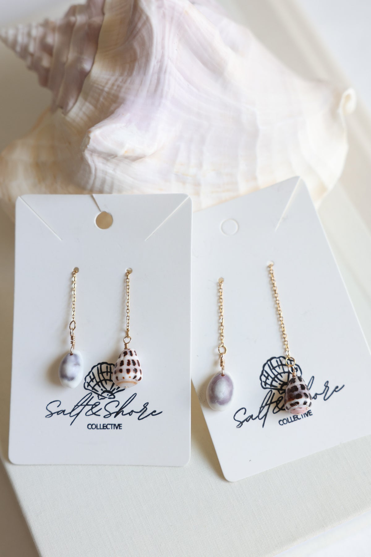 Hebrew & Cowrie earrings