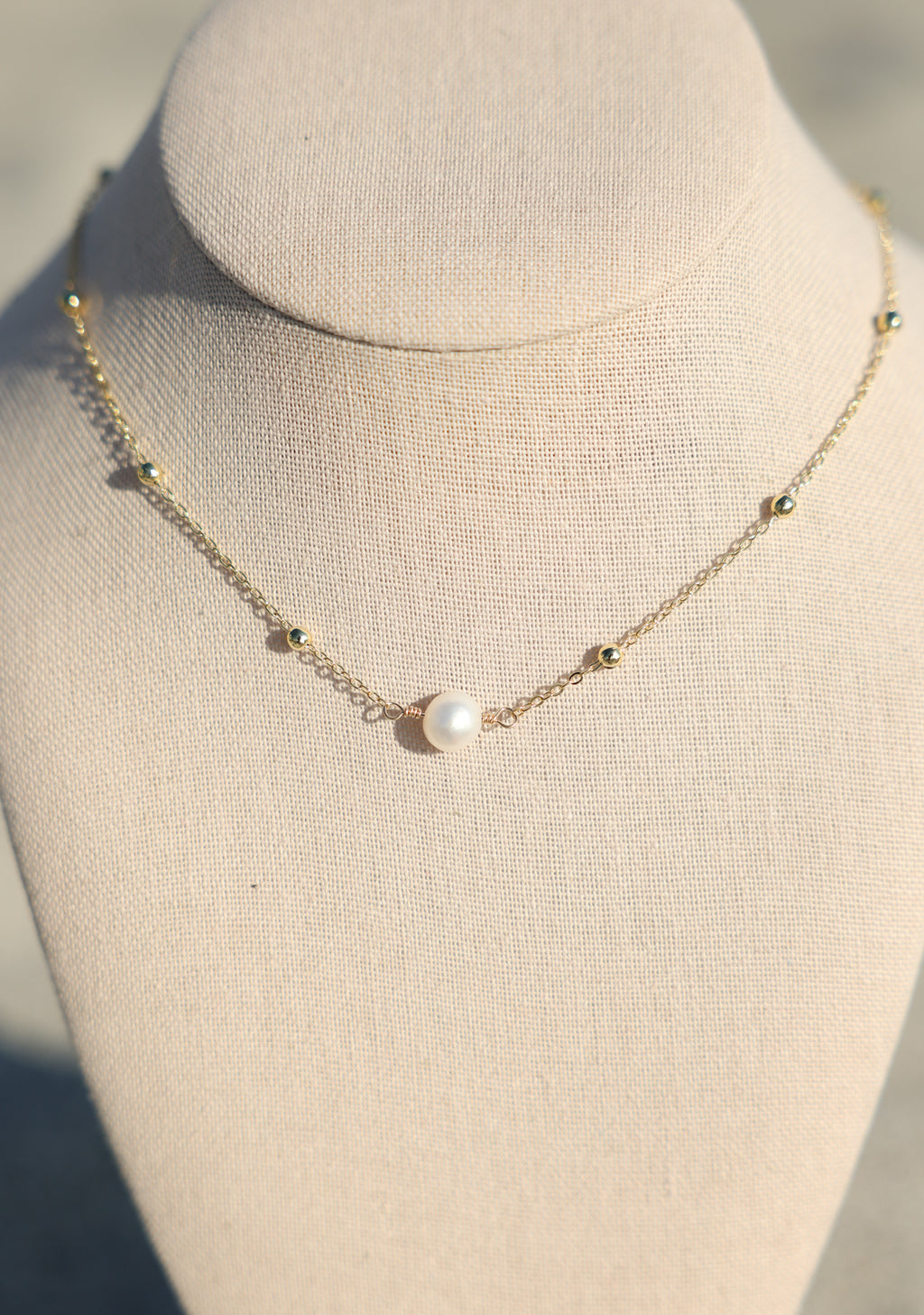 The pearl necklace