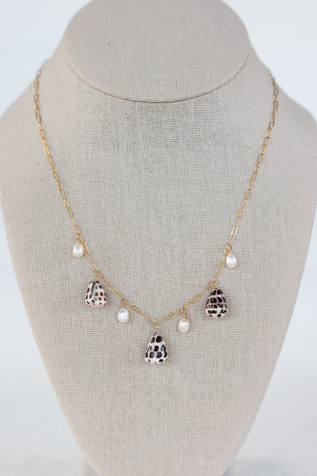 Cone shell charm necklace