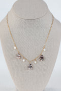 Cone shell charm necklace