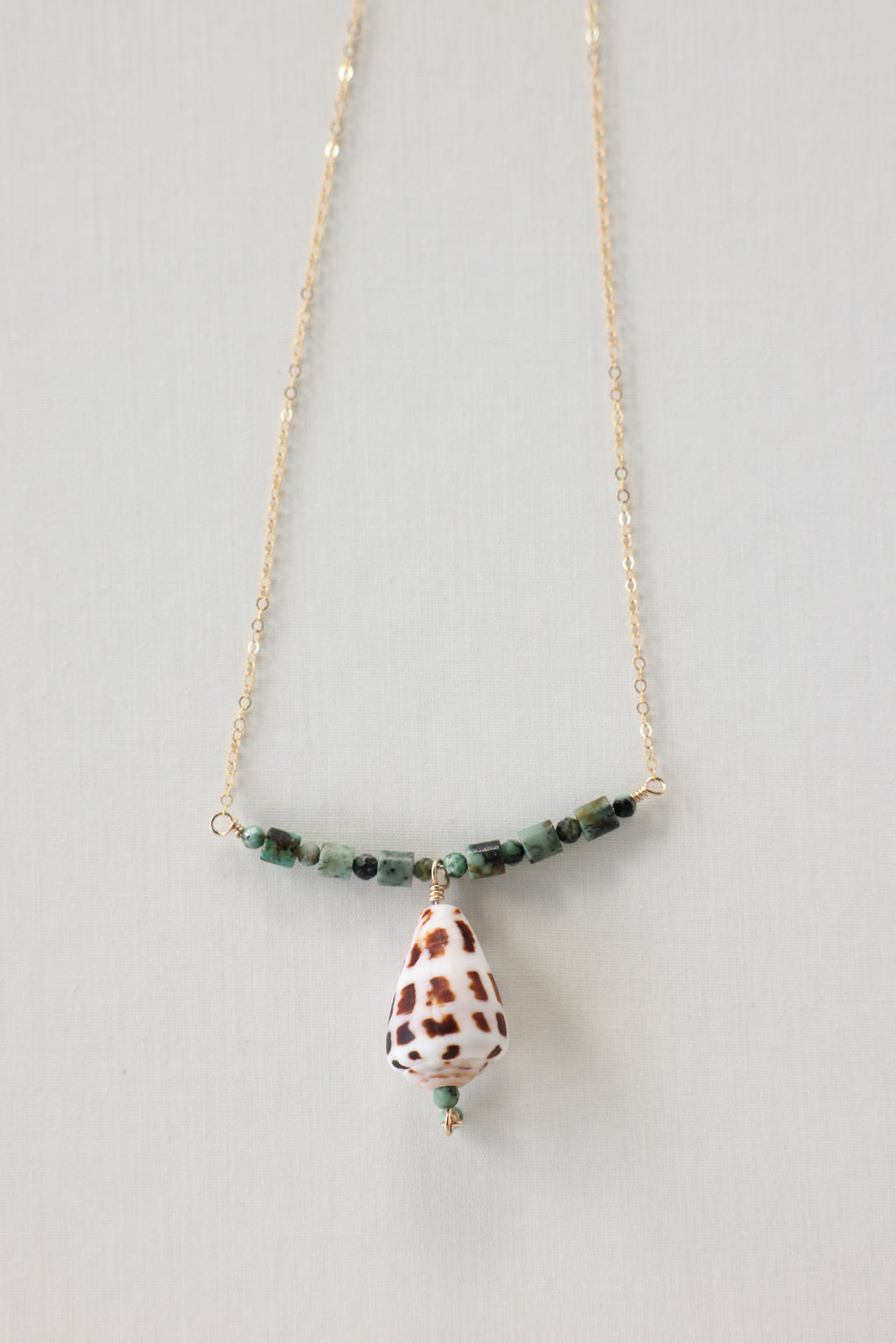 Hebrew cone shell necklace