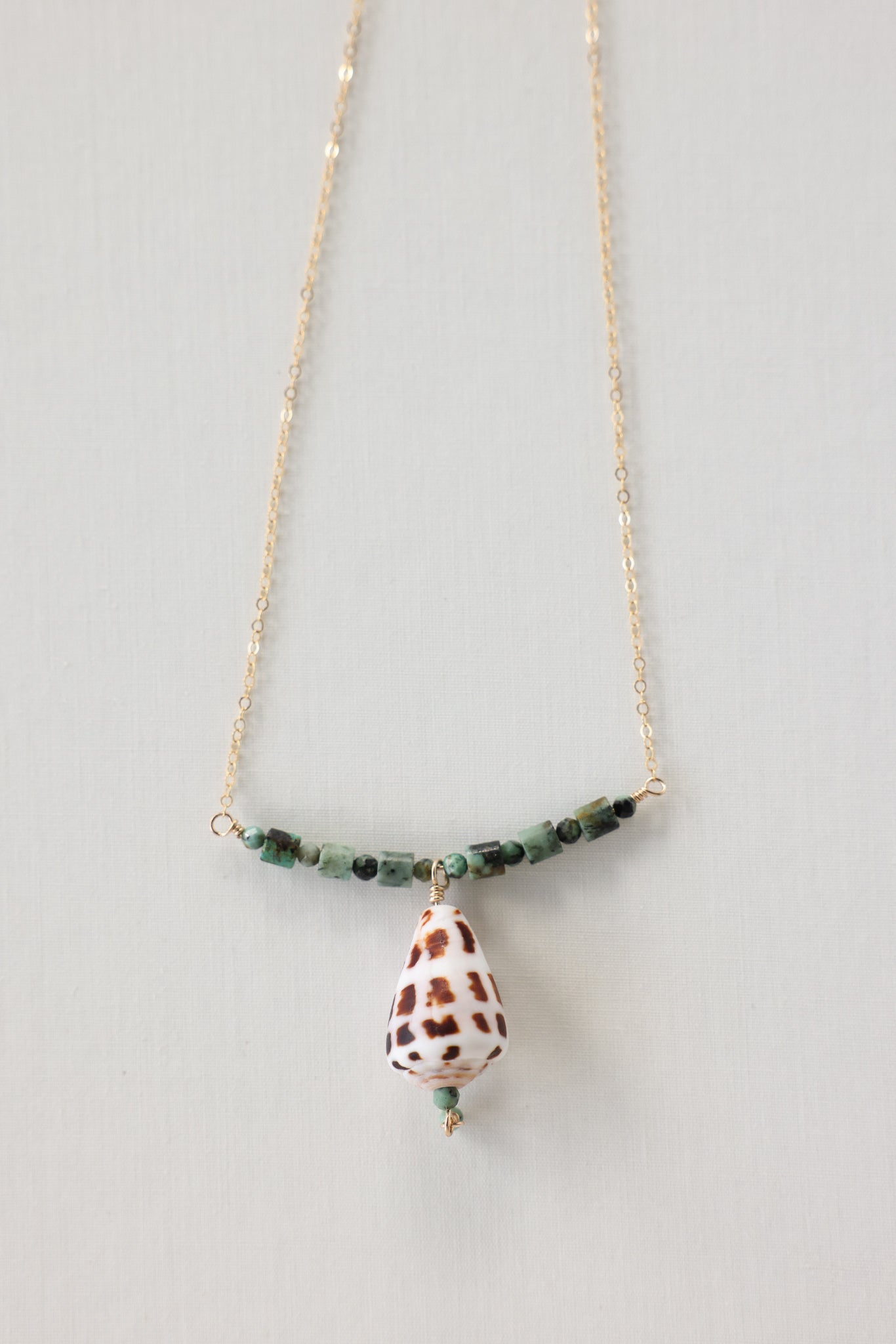 Hebrew cone shell necklace
