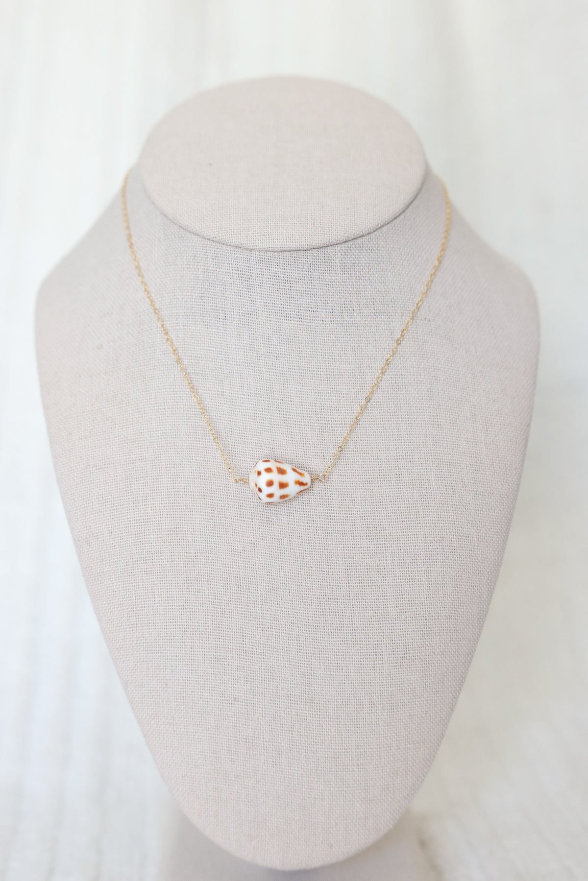 Cone shell necklace
