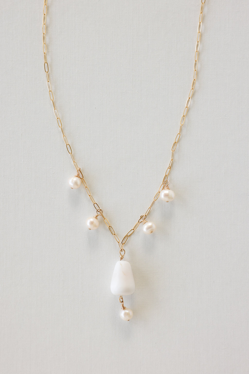 Cone shell charm necklace