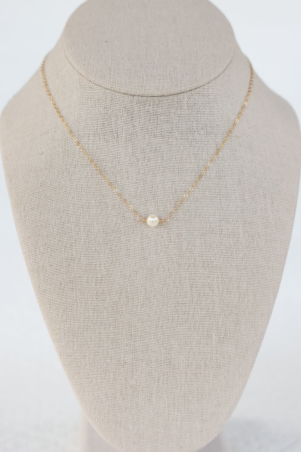 The pearl necklace