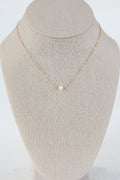 The pearl necklace