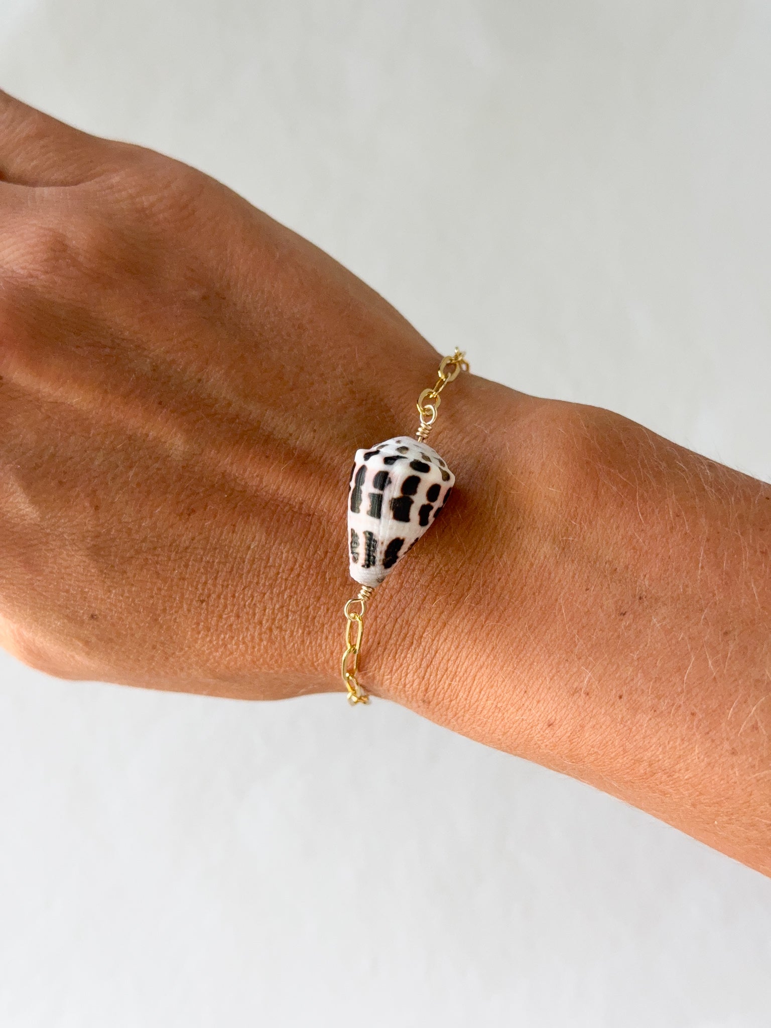 Hebrew cone shell bracelet